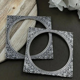 PAIR OF OXIDIZED JEWELLERY